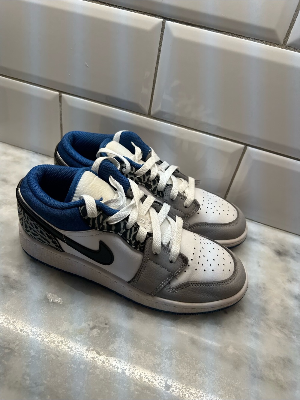 Nike Kids Low-Top Sneakers in White, Gray & Blue with Black Swoosh “True Blue”
